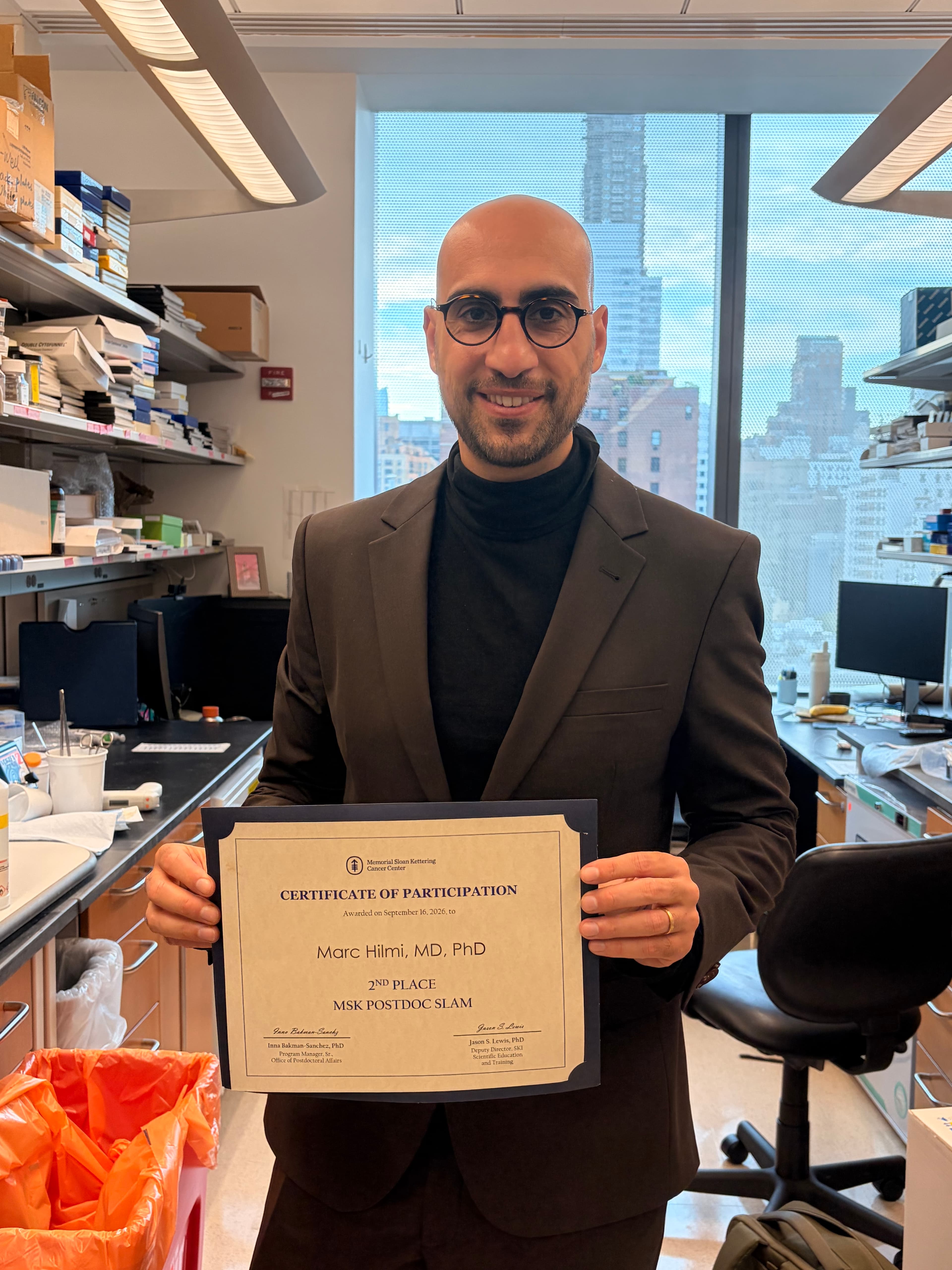 Marc Hilmi presenting his research on stage at Memorial Sloan Kettering Cancer Center.